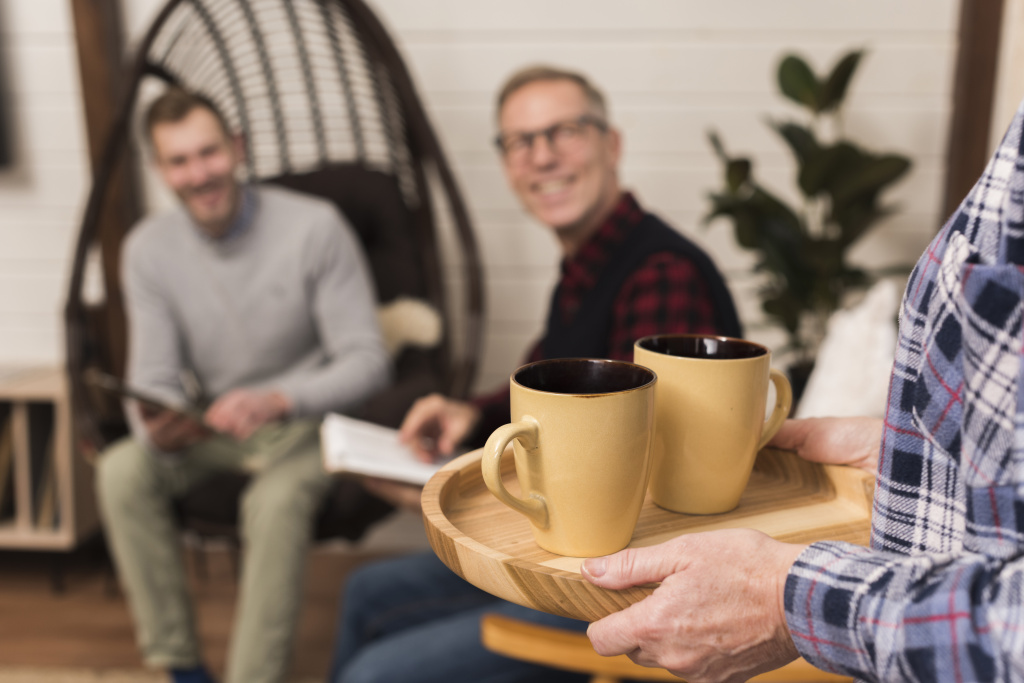 mother-carrying-tray-cups-with-defocused-father-son.jpg
